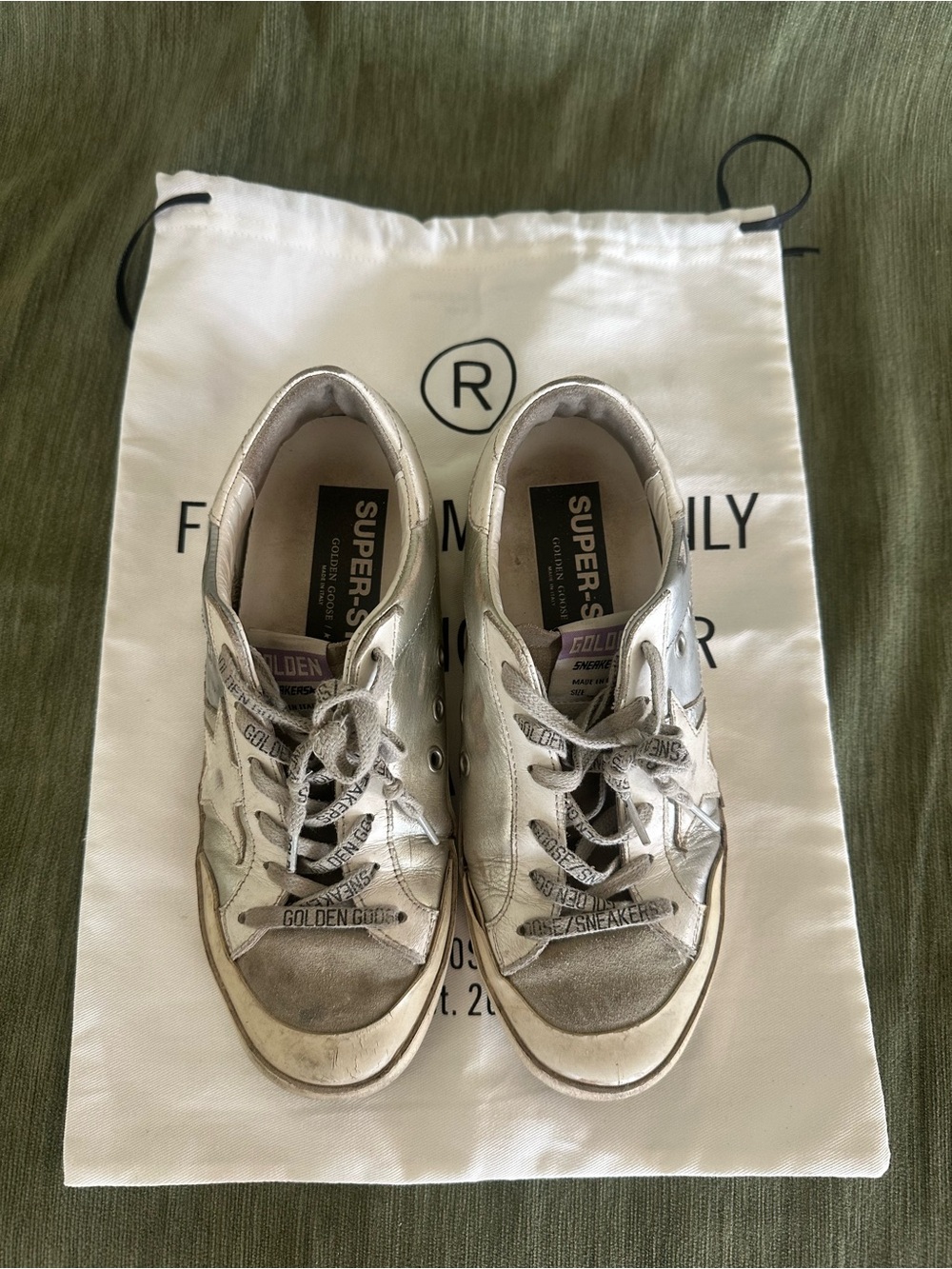 Golden Goose Women’s Metallic Silver Lace-Up Sneakers follow your dreams